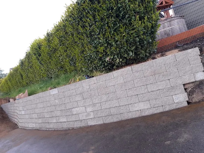 Stacked stone retaining wall built by Northwest Landscaping & Hardscaping
